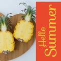 Composite of hello summer text and fresh halved pineapple on cutting board, copy space