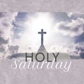 Composite of holy saturday text over silhouette cross on structure against cloudy sky on sunny day Royalty Free Stock Photo