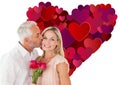Composite image of affectionate man kissing his wife on the cheek with roses Royalty Free Stock Photo