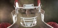 Composite image of american football player looking at camera Royalty Free Stock Photo