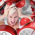 Composite image of angry blonde woman screaming and holding her head Royalty Free Stock Photo