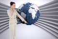 Composite image of asian businesswoman pointing Royalty Free Stock Photo