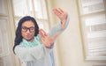 Composite image of asian woman making square with hands Royalty Free Stock Photo