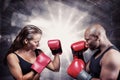 Composite image of athletes with fighting stance Royalty Free Stock Photo