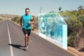 Composite image of athletic man jogging on open road