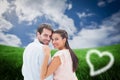 Composite image of attractive young couple smiling at camera Royalty Free Stock Photo