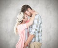 Composite image of attractive young couple about to kiss Royalty Free Stock Photo