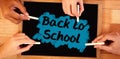 Composite image of back to school text on pink splash