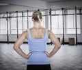 Composite image of back view of muscular woman Royalty Free Stock Photo