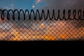 Composite image of barbed wire fence by white background Royalty Free Stock Photo