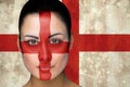 Composite image of beautiful england football fan in face paint Royalty Free Stock Photo