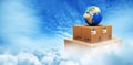 Composite image of blue globe on cardboard boxes Royalty Free Stock Photo
