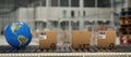 Composite image of boxes and globe on conveyor belt Royalty Free Stock Photo