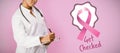 Composite image of breast cancer awareness ribbons with get checked text Royalty Free Stock Photo