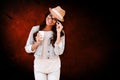 Composite image of brunette with disposable cup Royalty Free Stock Photo