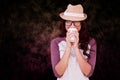 Composite image of brunette with disposable cup Royalty Free Stock Photo