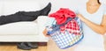 Composite image of brunette holding a basket full of laundry Royalty Free Stock Photo