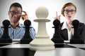 Composite image of business people playing chess