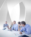 Composite image of business team having a meeting Royalty Free Stock Photo