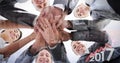 Composite image of business team standing hands together Royalty Free Stock Photo