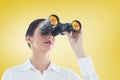 Composite image of business woman looking through binoculars Royalty Free Stock Photo