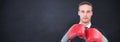 Composite image of businessman with boxing gloves Royalty Free Stock Photo
