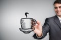 Composite image of businessman drawing coffee cup