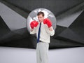 Composite image of businessman with his boxing gloves Royalty Free Stock Photo