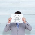Composite image of businessman holding blank sign in front of his head Royalty Free Stock Photo