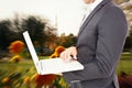 Composite image of businessman holding laptop Royalty Free Stock Photo