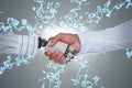 Composite image of businessman and robot shaking hands Royalty Free Stock Photo