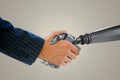 Composite image of businessman shaking hand of robot Royalty Free Stock Photo