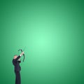 Composite image of businessman shooting bow and arrow Royalty Free Stock Photo