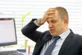 Composite image of businessman stressed out at work