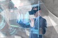 Composite image of businessman using virtual reality headset Royalty Free Stock Photo