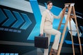 Composite image of businesswoman climbing career ladder with briefcase Royalty Free Stock Photo