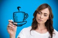 Composite image of businesswoman drawing coffee cup