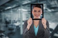 Composite image of businesswoman holding digital tablet Royalty Free Stock Photo