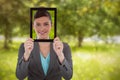 Composite image of businesswoman holding digital tablet Royalty Free Stock Photo