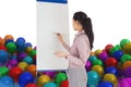 Composite image of businesswoman painting on an easel