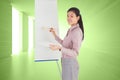 Composite image of businesswoman painting on an easel