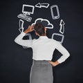 Composite image of businesswoman scratching her head Royalty Free Stock Photo