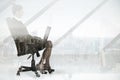 Composite image of businesswoman sitting on swivel chair with laptop