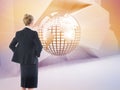 Composite image of businesswoman standing with hands on hips Royalty Free Stock Photo