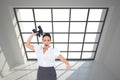 Composite image of businesswoman throwing binoculars away Royalty Free Stock Photo