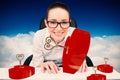 Composite image of businesswoman typing on a keyboard Royalty Free Stock Photo