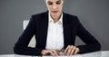 Composite image of businesswoman typing on keyboard at desk Royalty Free Stock Photo