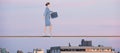 Composite image of businesswoman walking with briefcase over white background Royalty Free Stock Photo