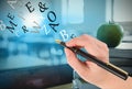 Composite image of businesswomans hand writing with fountain pen Royalty Free Stock Photo