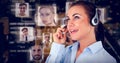 Composite image of call center agent looking upwards while talking Royalty Free Stock Photo
